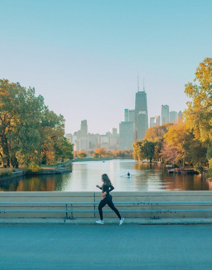 Aerial view of the Chicago skyline and the Chicago River during the day.
