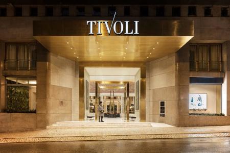 The grand historic facade of the Tivoli Avenida Liberdade hotel in Lisbon.
