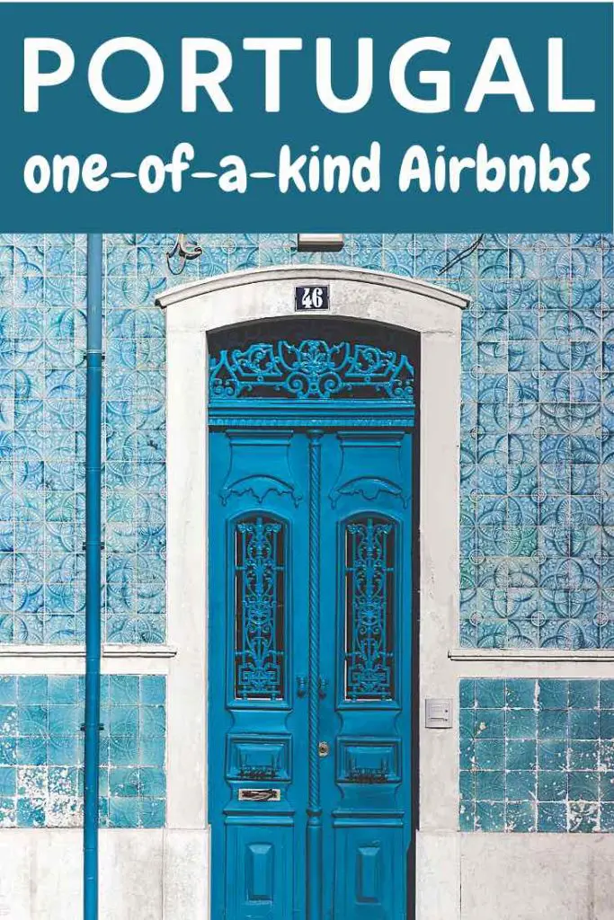 Detailed view of a turquoise door surrounded by traditional blue and white azulejo tiles.