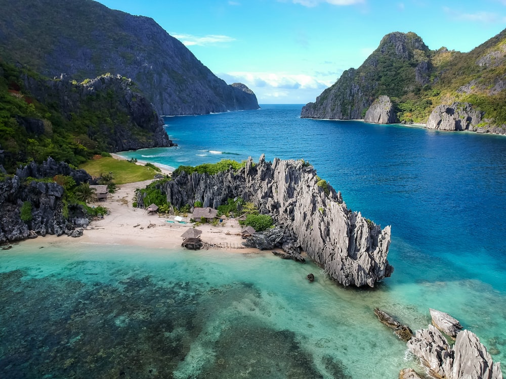 The Big Lagoon in El Nido, Philippines, with emerald waters surrounded by tall limestone cliffs.