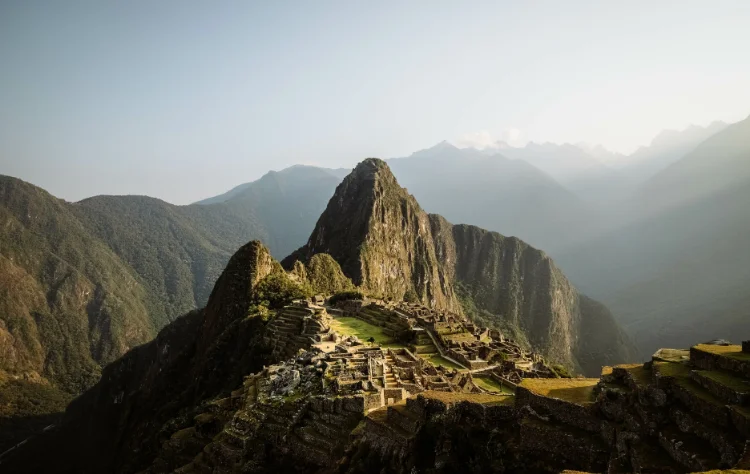 Ancient mountainous terrain and stone ruins in the Peruvian Andes.