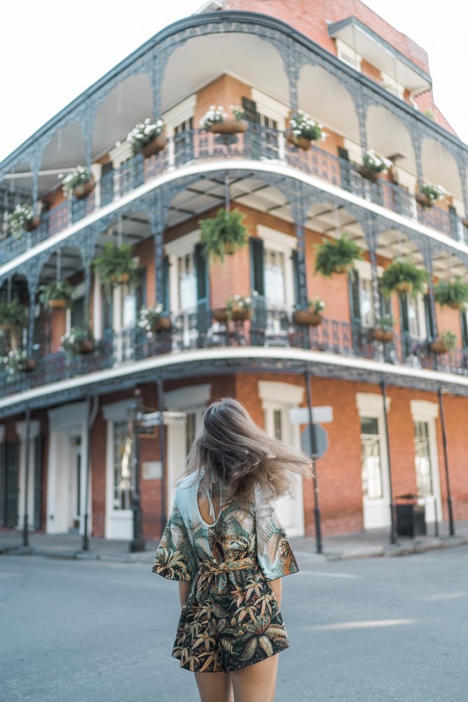 Colorful historic buildings and balconies in the French Quarter of New Orleans.