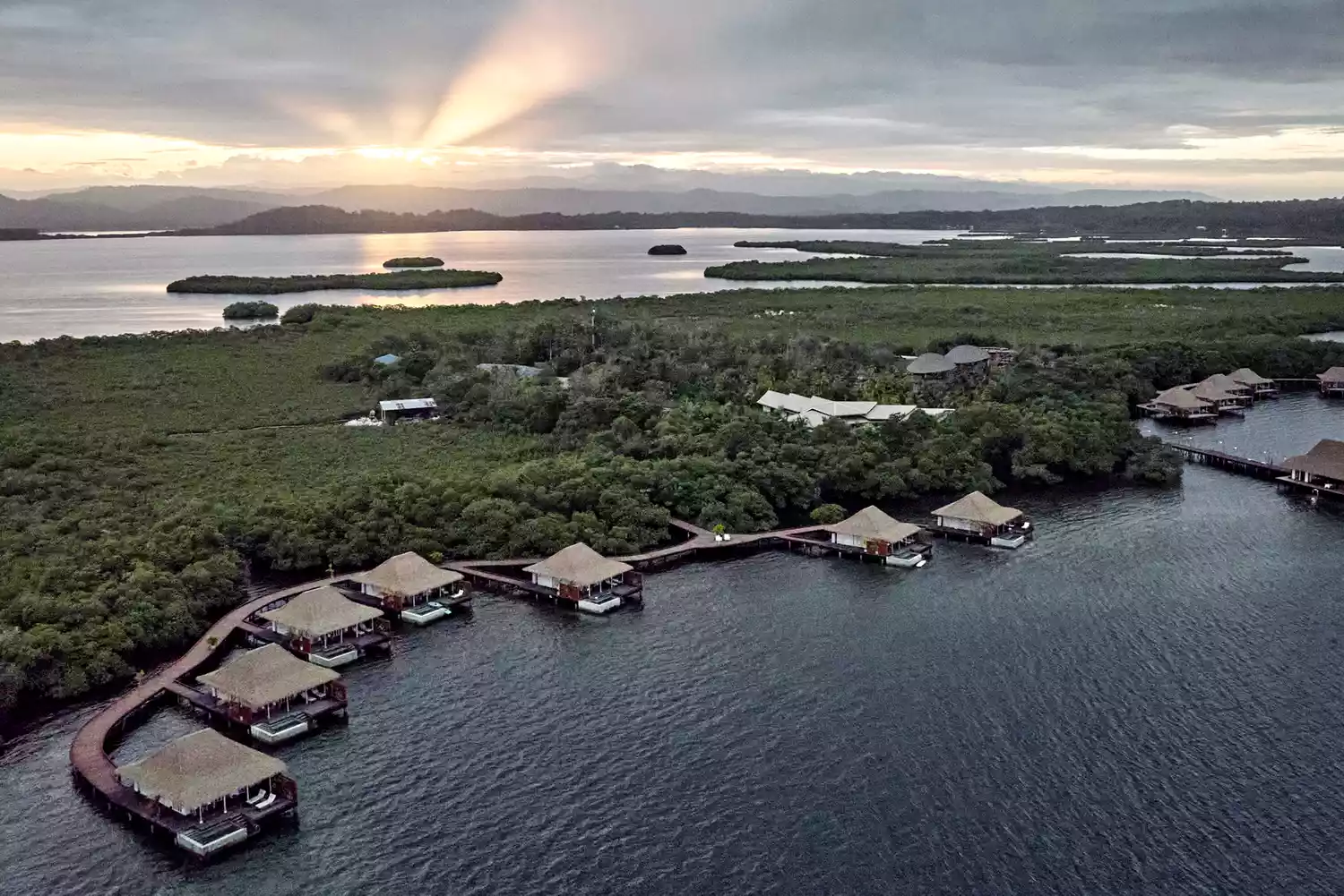 Aerial view of the Nayara Bocas del Toro resort and its overwater villas.