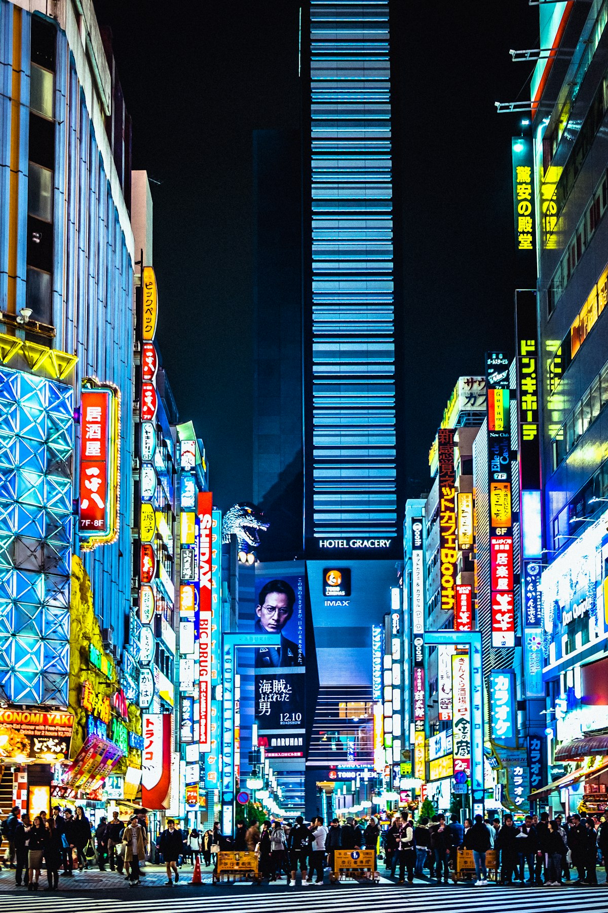 Modern skyscrapers of the Shinjuku district against a clear sky.