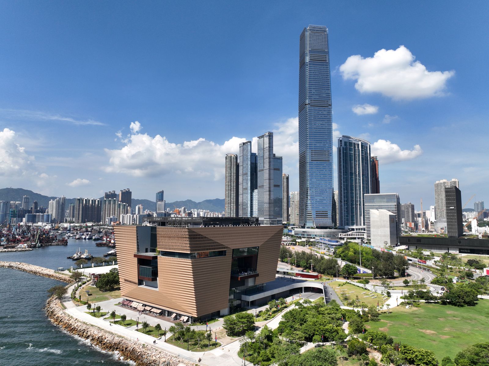 Modern high-rise skyscrapers and glass-walled office buildings in Hong Kong.