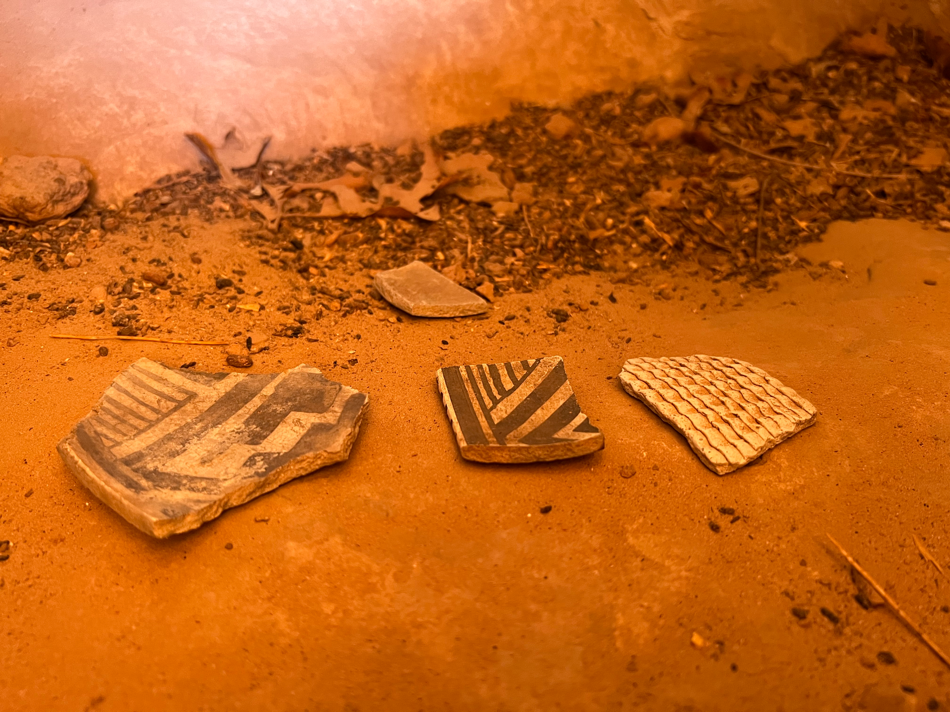 Scenic sandstone rock formations surrounded by sparse desert vegetation near Kanab, Utah.