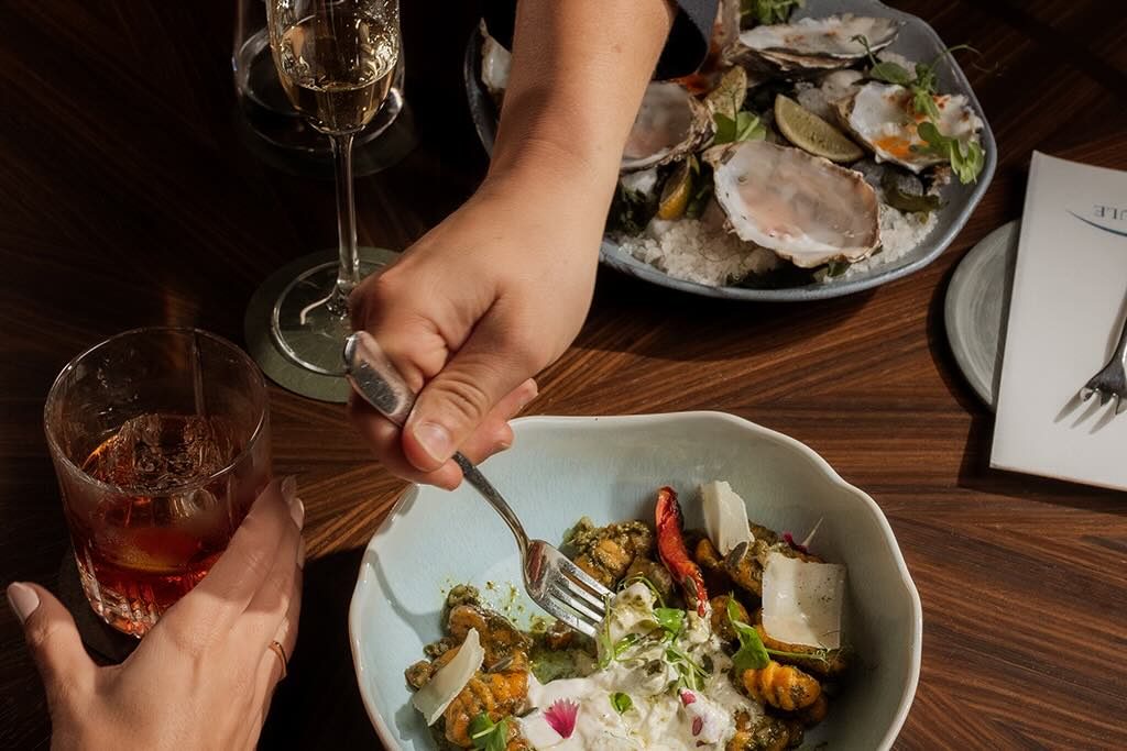 An exquisitely plated gourmet dish featuring seasonal Cape ingredients.