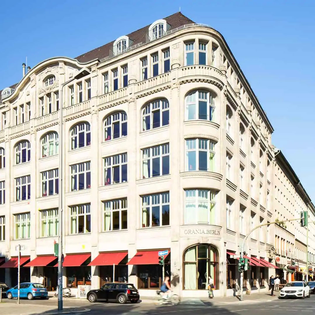 The historic brick facade of Hotel Orania.Berlin located on a street corner in Kreuzberg.