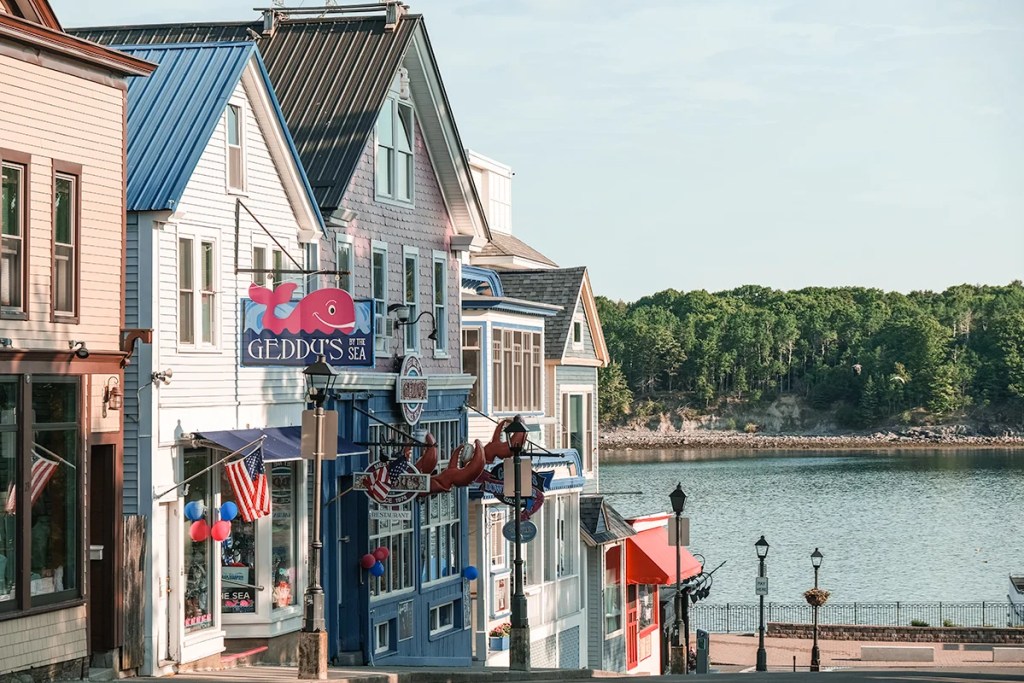 The colorful storefronts and busy sidewalks of downtown Bar Harbor during the summer.