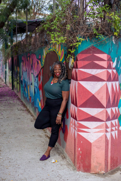 Lush green space and walking paths in Ibirapuera Park, a central public park in São Paulo.