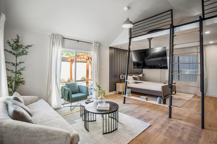 Exterior of a modern white tiny home with a minimalist layout in the East End of Houston.