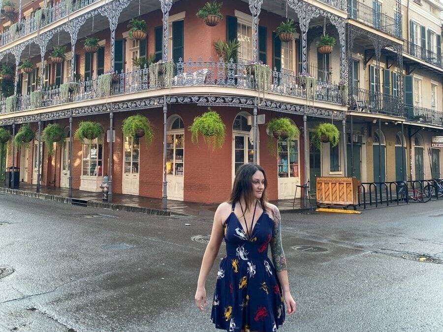 Colorful historic buildings with iron balconies in the French Quarter of New Orleans.