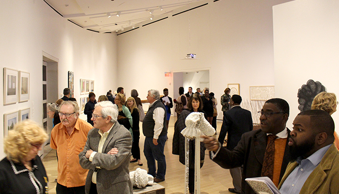 A modern art installation inside the minimalist architecture of the Jepson Center.