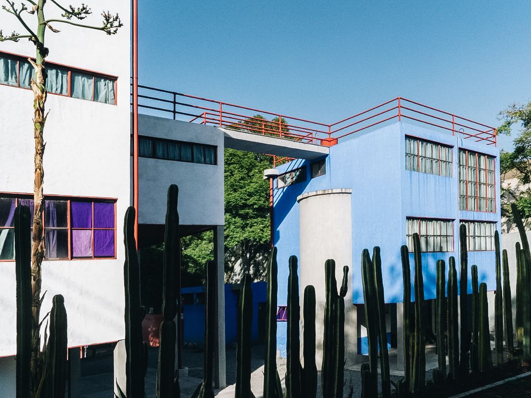 An architectural view of a building reflecting the design legacy of Juan O'Gorman in Mexico City.