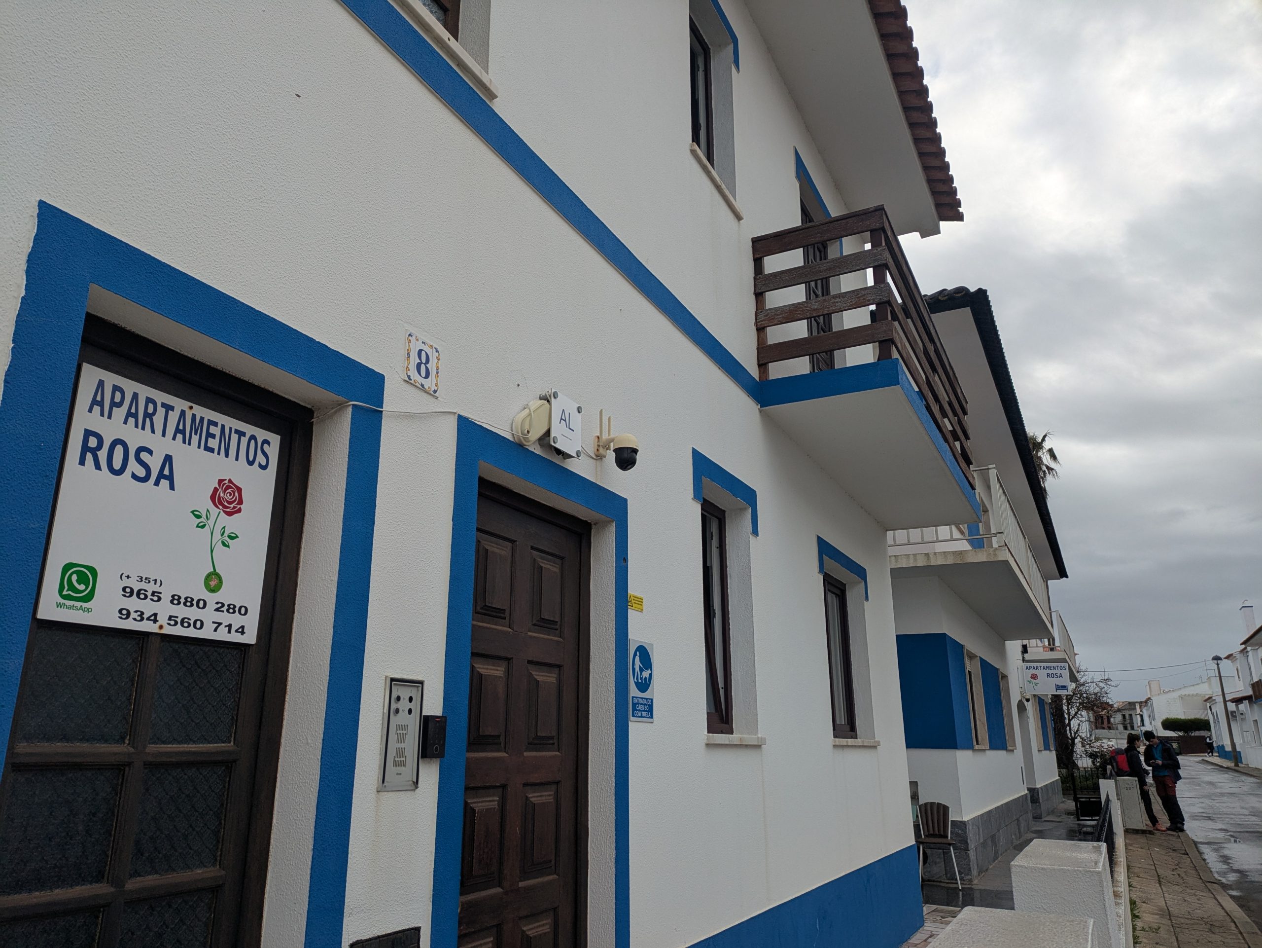 Interior view of a bright, modern, and clean guest room in a Portuguese guesthouse.