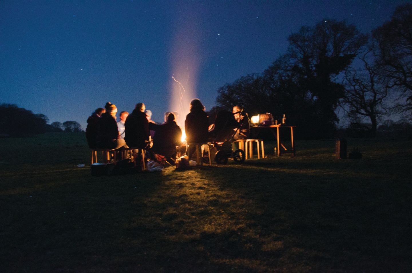 A snowy mountain landscape in the Lake District overlooking a quiet valley.