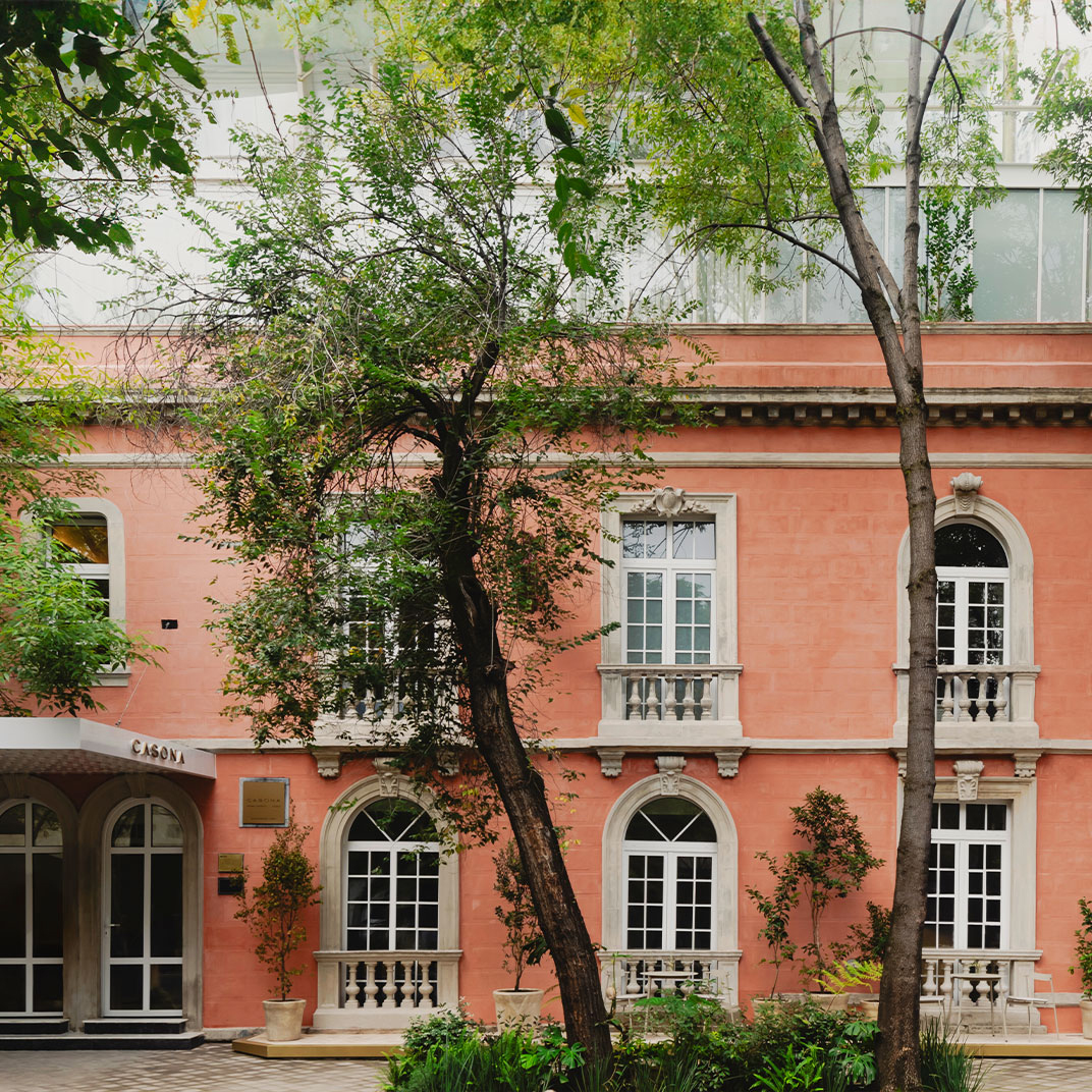 The pink Belle Époque facade of Casona Roma Norte in Mexico City.