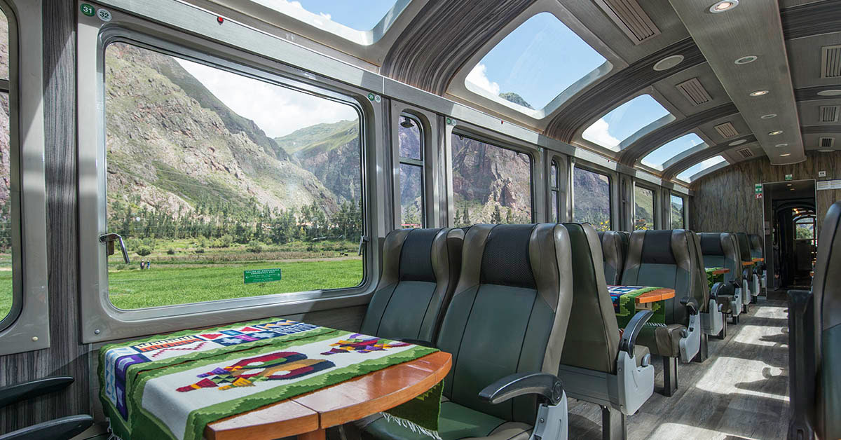 Interior of a modern train with panoramic windows designed for sightseeing.
