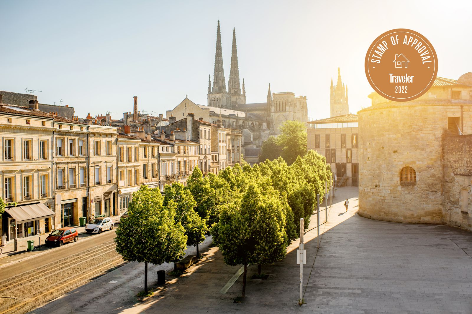 A vintage sidecar tour through a lush vineyard landscape in France.