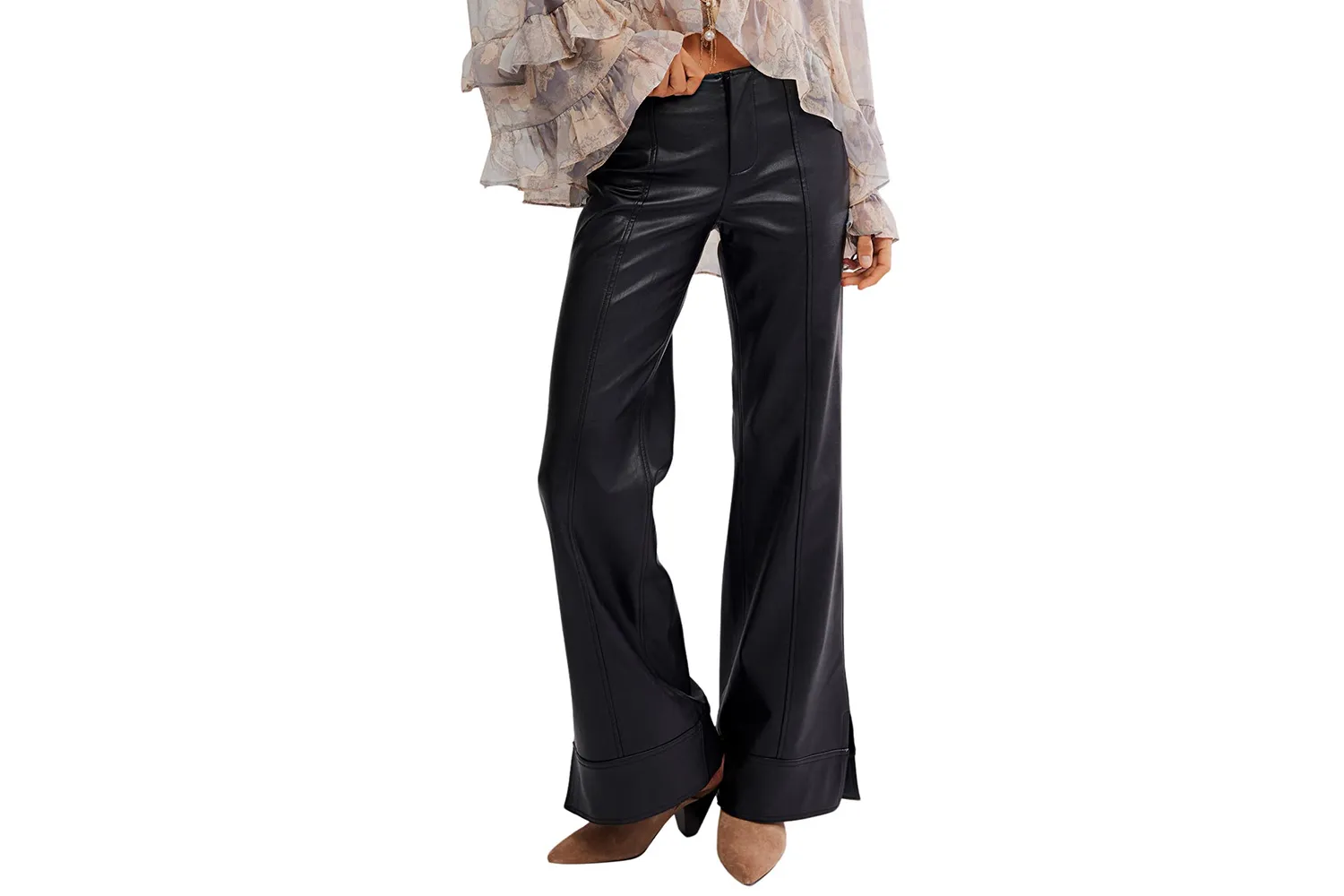 Wide-leg brown faux leather trousers styled with boots.
