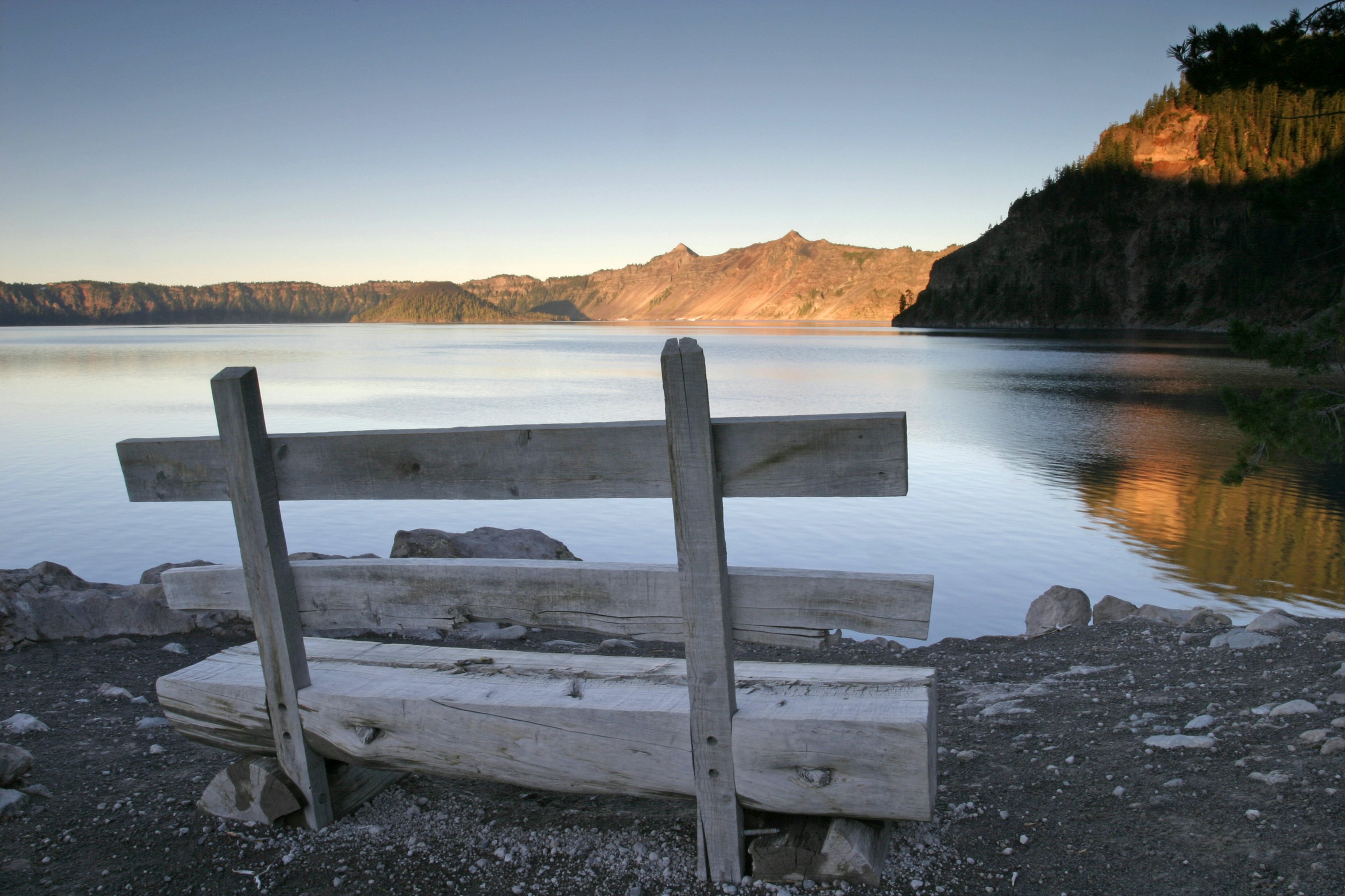 A wide view of Wizard Island within Crater Lake as seen from the Cleetwood Cove area.