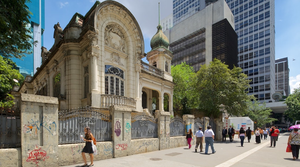 Classic heritage architecture with ornate details along a street in São Paulo.