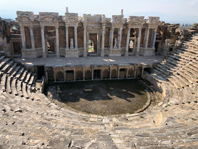 The grand facade of the Library of Celsus at the ancient Roman ruins of Ephesus.