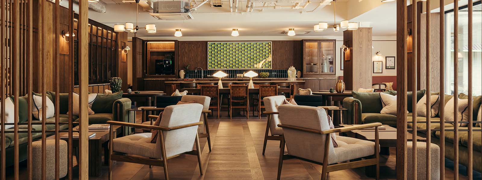 The plush, warmly lit interior of a lounge at the Gleneagles Sporting Club.