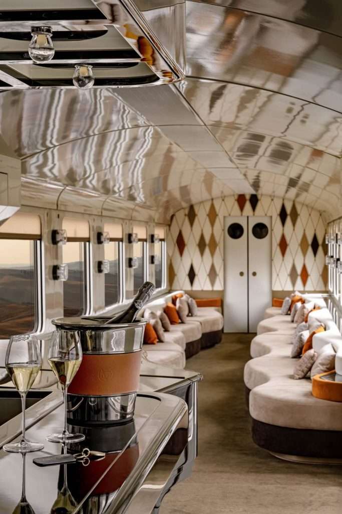 The exterior of the La Dolce Vita Orient Express luxury train at a station in Italy.
