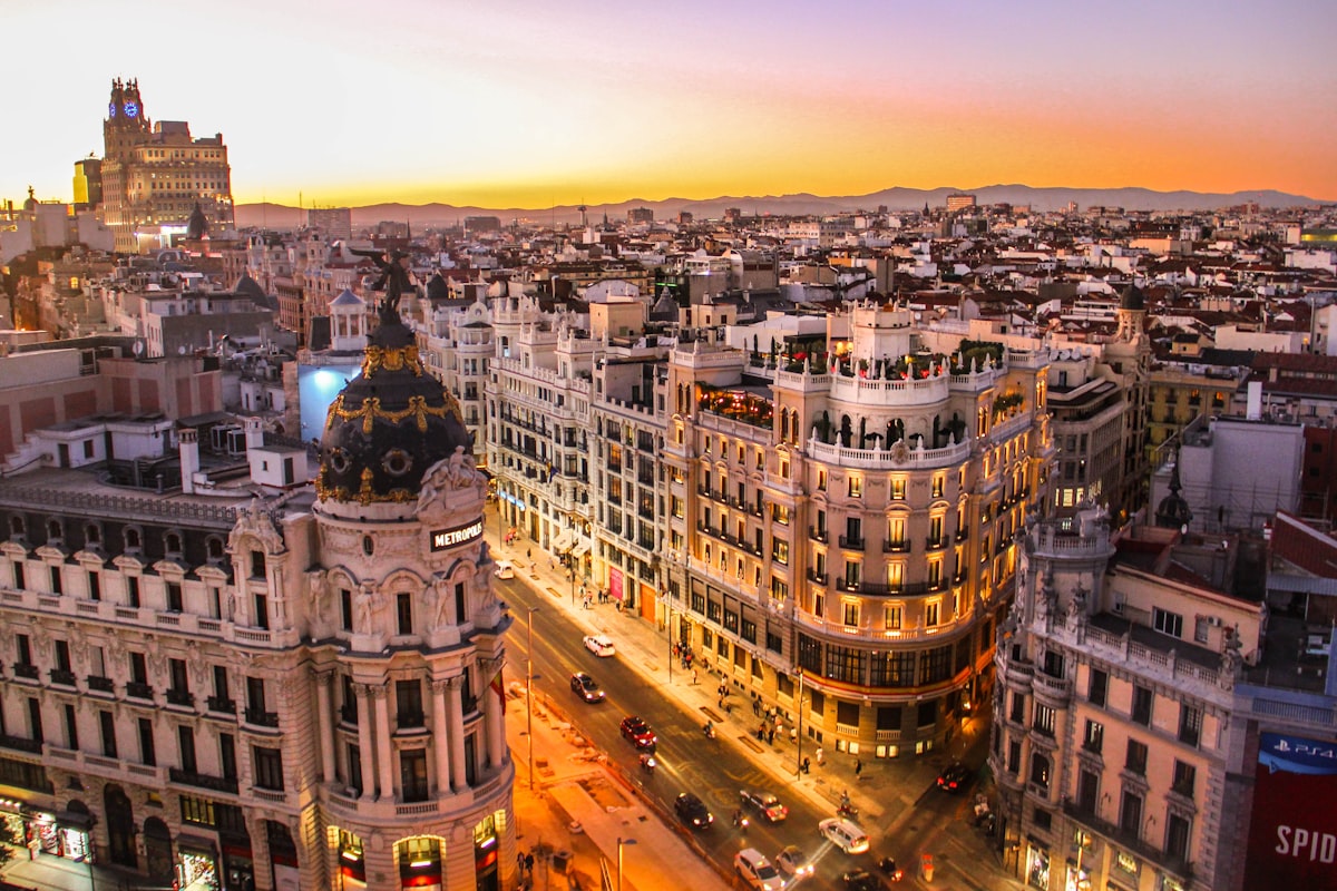 A wide-angle view of the Barcelona skyline with the Sagrada Familia visible.