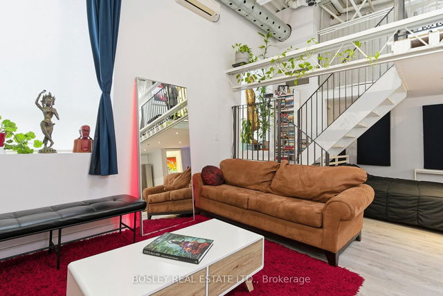 Interior of a residential unit in a converted loft building at 347 Sorauren Avenue.