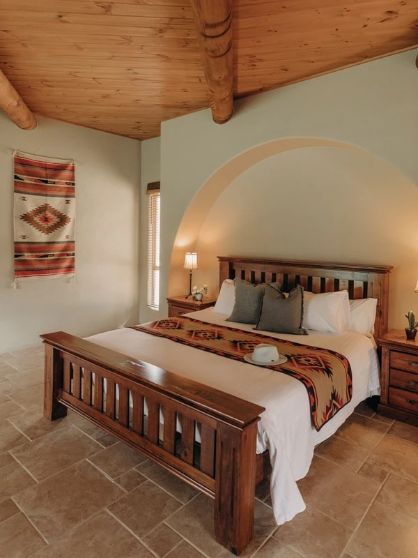 Pueblo-style white architecture with desert-inspired landscaping.