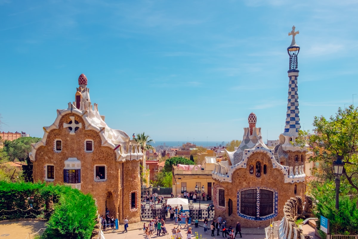 Detailed mosaic tiling and organic architectural shapes at Park Güell.