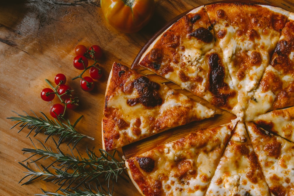 A gourmet pizza served on a rustic wooden table in a Toronto restaurant.