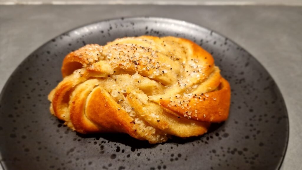A single cardamom bun from the Lidl bakery section.